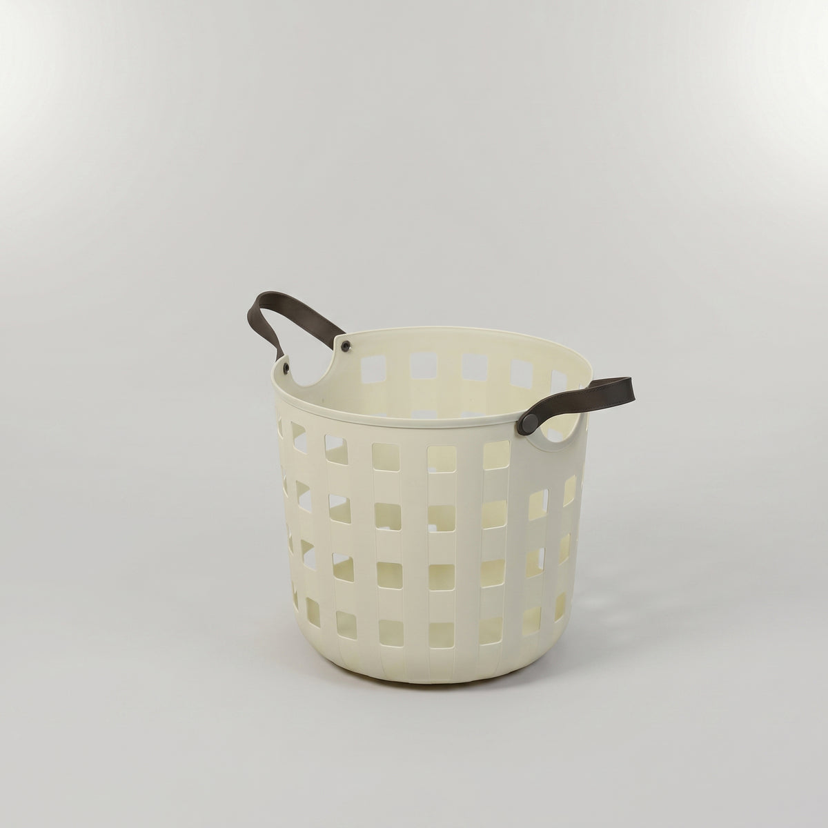 Cream Plastic Flexible Laundry Basket with Leather Handles by Zodiya