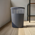 Blue Plastic Trash Can by Zodiya