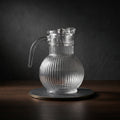 Clear Glass Jar with Round Base by Zodiya