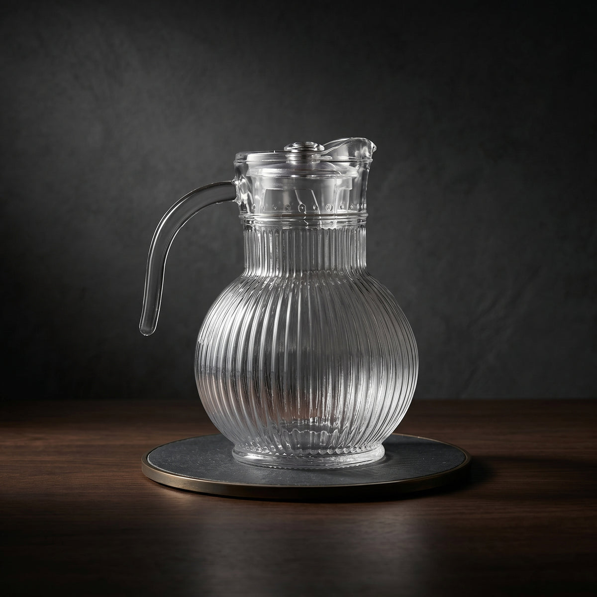 Clear Glass Jar with Round Base by Zodiya