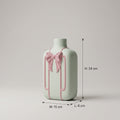 Small Ceramic Vase with Pink Ribbon Design by Zodiya