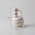 Brown and White Ceramic Vase By Zodiya