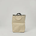 Beige Linen Laundry Bag with Ring Handles by Zodiya