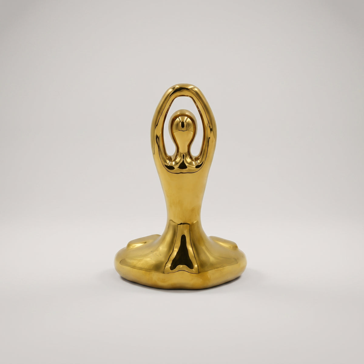 Gold Toned Metal Sculpture by Zodiya