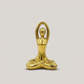 Gold Toned Metal Sculpture by Zodiya