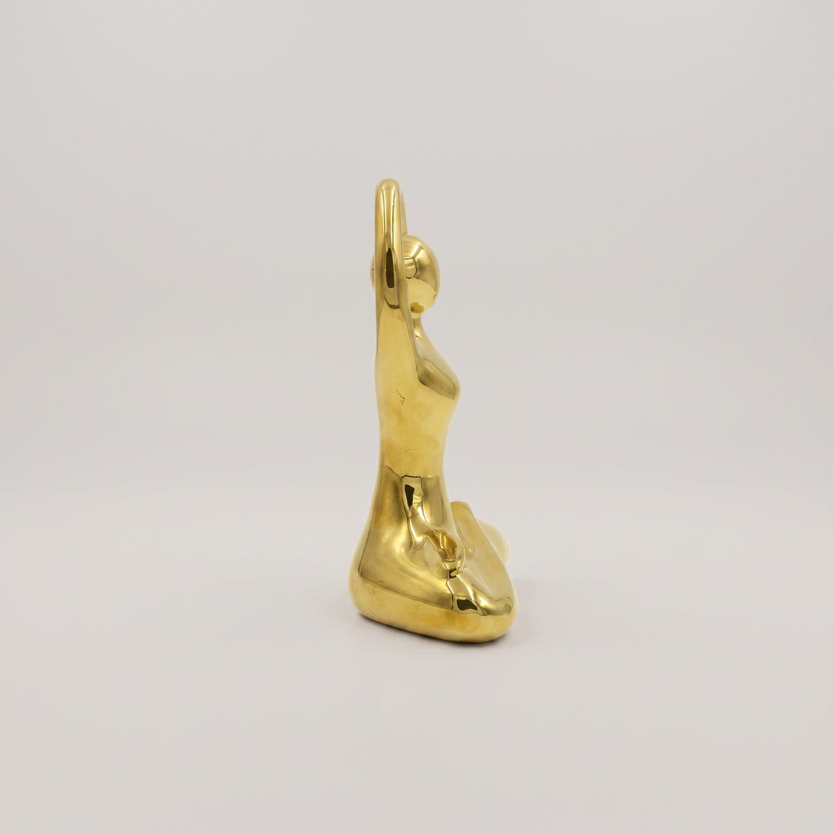Gold Toned Metal Sculpture by Zodiya