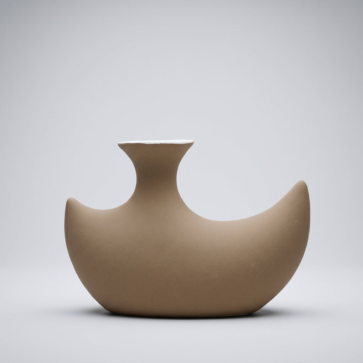 Brown Crescent Shape Ceramic Vase By Zodiya