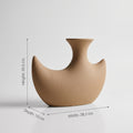 Brown Crescent Shape Ceramic Vase By Zodiya