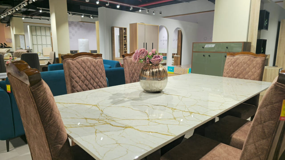 Dining table display at Zodiya furniture store, HiLITE Mall Kozhikode
