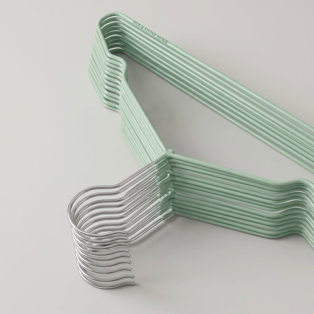Green Metal Cloth Hanger By Zodiya
